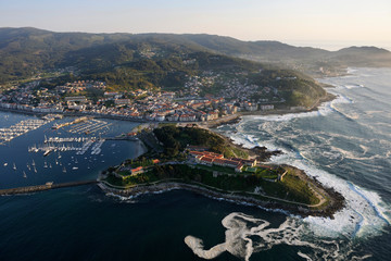  aerial image of the coastal city of baiona in pontevedra, galicia