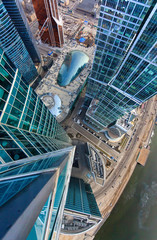 The view from the roof of the business center on the embankment of the complex of Moscow City on the glass facade and other tower