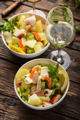 salad with seafood, potato and celery