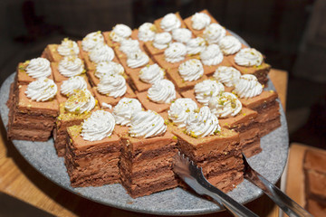 Chocolate Cakes with whipped cream and ground pistacio