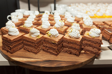 Chocolate Cakes with whipped cream and ground pistacio