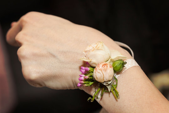 Corsage on the Wrist of Bridesmaids hand