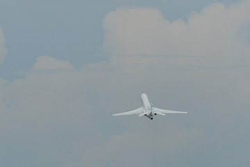 Passenger airplane taxiing on runway of airport