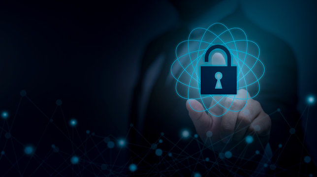 Man hand holding smart technology with cyber security concept.Protect information data concept