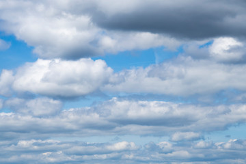 Big cumulonimbus on blue sky. Cumulus, stratocumulus, stratus, altocumulus, nimbostratus.