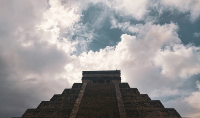 Mayan Pyramid of Chichen Itza on a cloudy day, Mexico