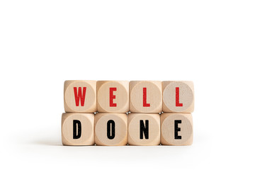 cubes showing the message "well done", isolated on white