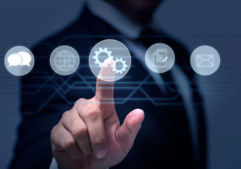 Technical Support Customer Service  of Business Technology Internet.businessman hand working with modern digital tablet computer in modern office with virtual icon diagram