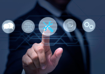 Technical Support Customer Service  of Business Technology Internet.businessman hand working with modern digital tablet computer in modern office with virtual icon diagram