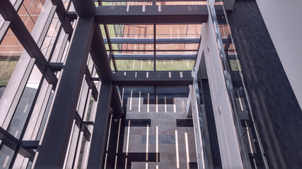 Symmetric office interior with long corridor