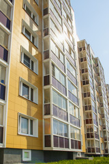 new multi-storey residential building in the background