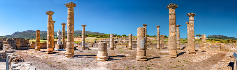 Panorama view of the ancient Romans ruins of Baelo Claudia, next to the beach of Bolonia, near Tarifa in Cadiz in the south of Spain.