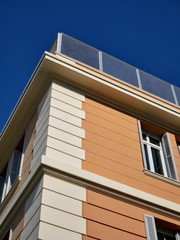 Elegant building against blue sky
