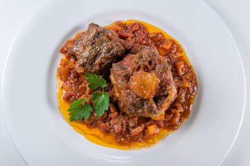 Dish with portion of oxtail stewed