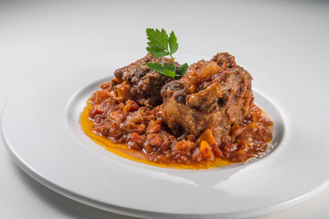 Dish with portion of oxtail stewed
