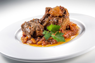 Dish with portion of oxtail stewed