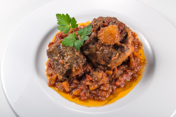 Dish with portion of oxtail stewed