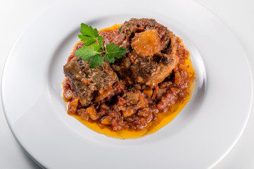 Dish with portion of oxtail stewed