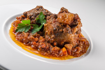 Dish with portion of oxtail stewed