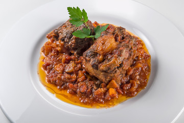 Dish with portion of oxtail stewed