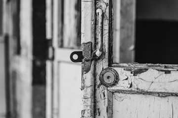 old door lock on a white wooden door