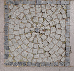 Stone floor pattern with a crack gray background close up