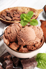 Chocolate coffee ice cream ball in a bowl. ice cream scoop