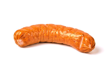 Boiled sausage in a natural shell on a white background. Meat juicy sausage with glitter on a light background.