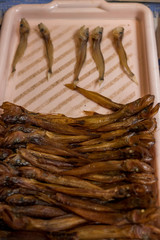 Baikal fish hot smoked and dried on the street market. Listvyanka, Siberia, Russia