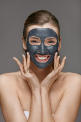Beauty face skin care. Woman with cosmetic spa facial mask
