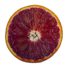slice of blood red orange isolated on white background. top view