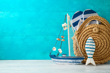 Summer vacation background with nautical decorations and  fashion bag on wooden table