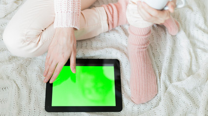 hand holding mobile phone with touch screen interface