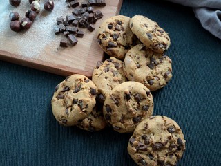 chocolate chips cookies and wood backgound