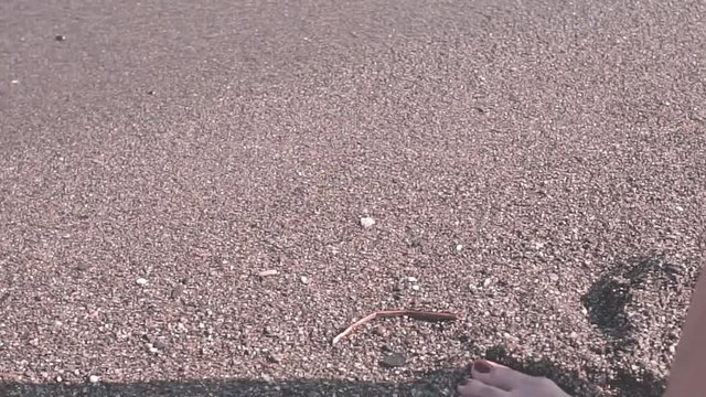 Fat woman walking on the beach. Summer times