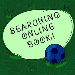 Handwriting text Searching Online Book. Concept meaning resource in book that is offered to read online Soccer Ball on the Grass and Blank Outlined Round Color Shape photo