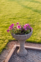 round stone flower bed