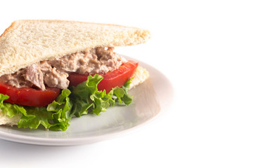 Tuna Salad Sandwich with Tomato and Lettuce Isolated on a White Background