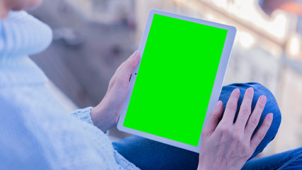 man holding digital tablet