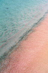 Fototapeta na wymiar Colorful sand on tropic beach. Copy space. 