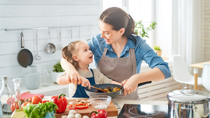 Happy family in the kitchen.
