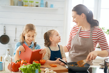 Happy family in the kitchen.