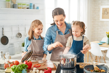 Happy family in the kitchen.
