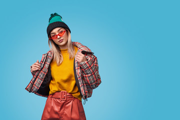 Strange woman adjusting jacket