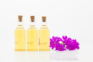 primrose essential oil in  beautiful bottle on table
