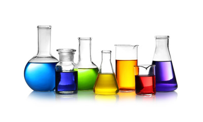 Set of different lab glassware with color liquid isolated on white