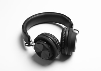 Fototapeta na wymiar Stylish modern wireless headphones on white background