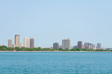 Fototapeta premium Skyline with Lake Michigan of the Lincoln Park and Lakeview Neighborhoods of Chicago