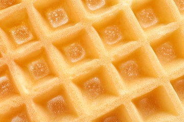 Delicious waffle for breakfast as background, closeup