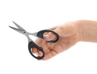 Woman holding scissors on white background, closeup